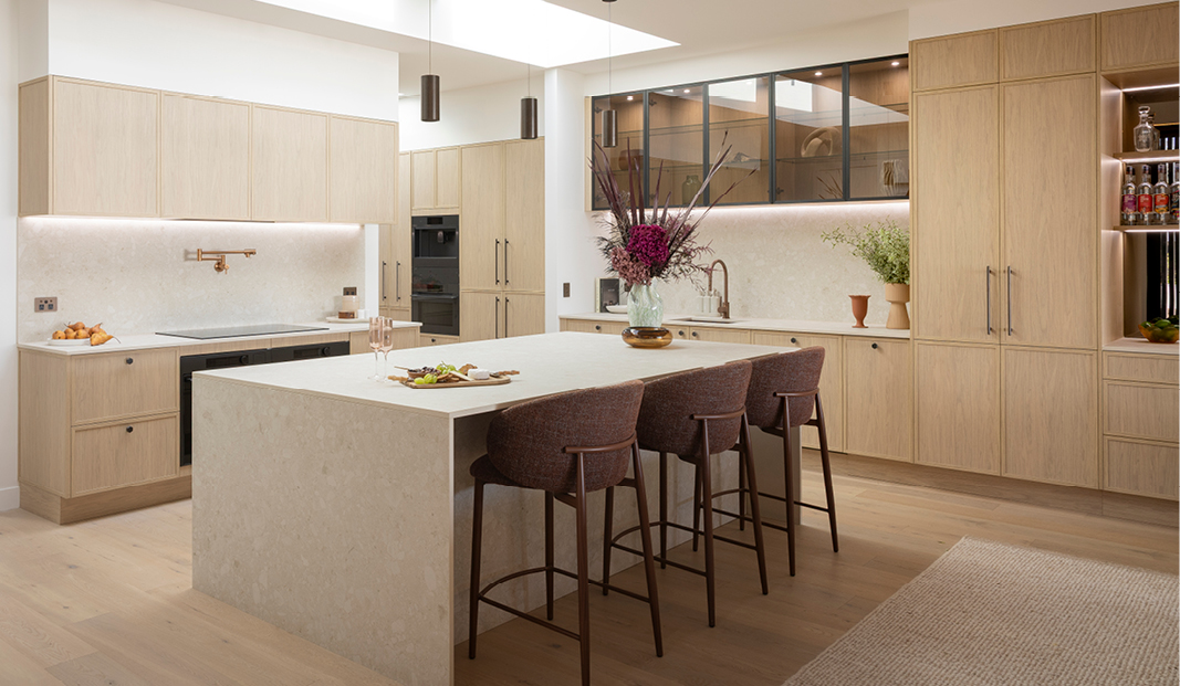 Kinsman Designer Range kitchen featuring warm timber tones and integrated appliances
