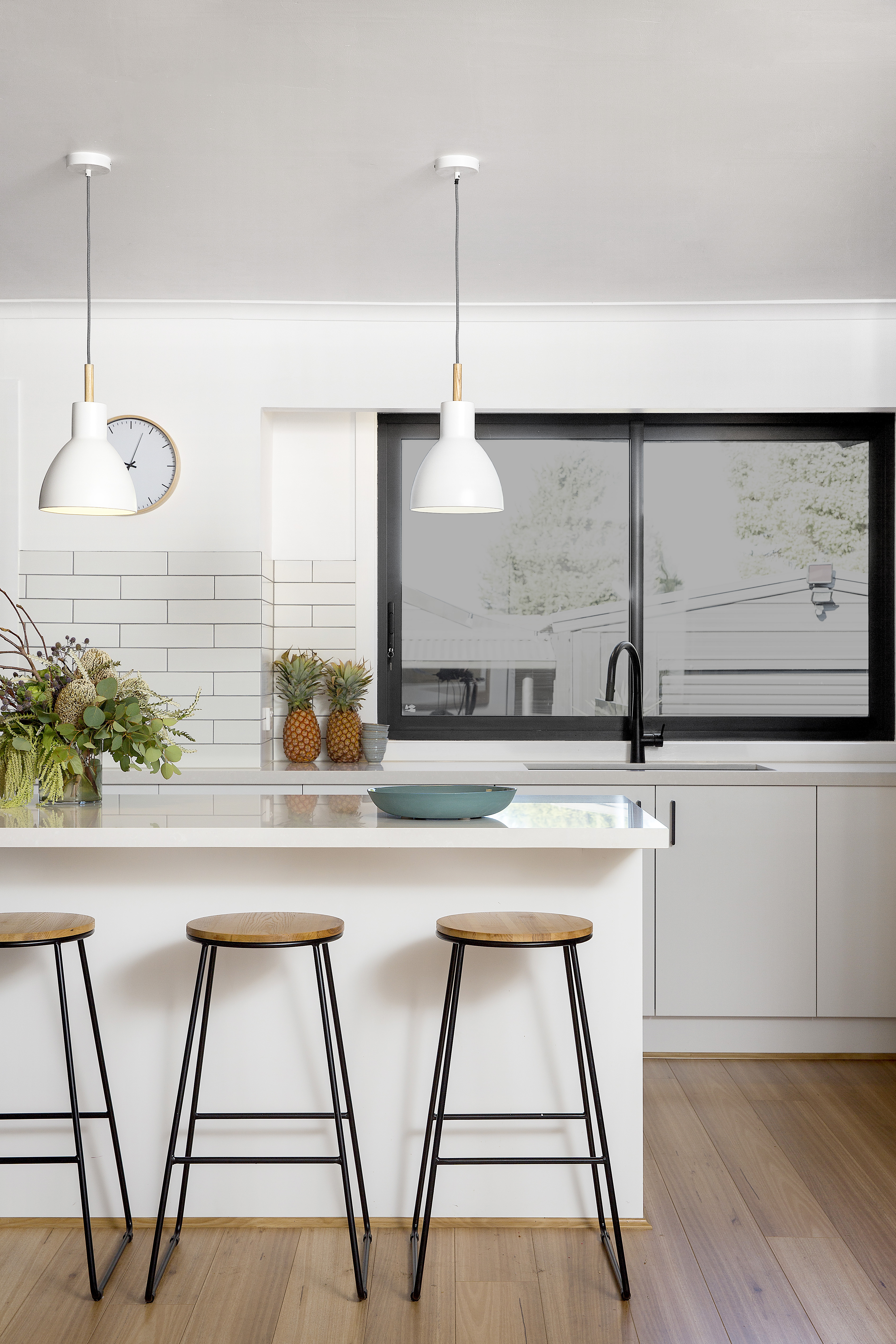 Contemporary shaker style kitchen with white cabinetry