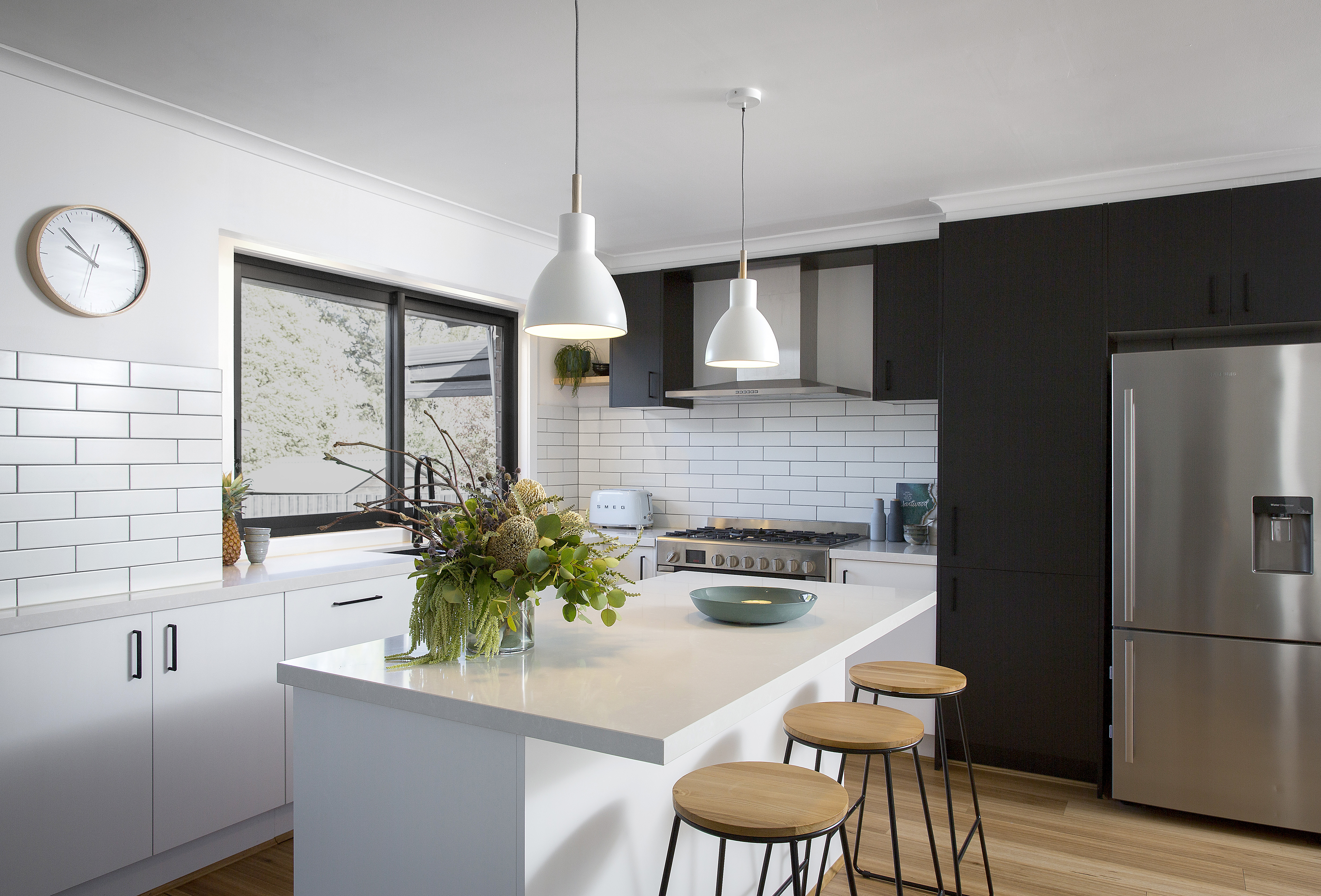 Contemporary small kitchen design in black and white