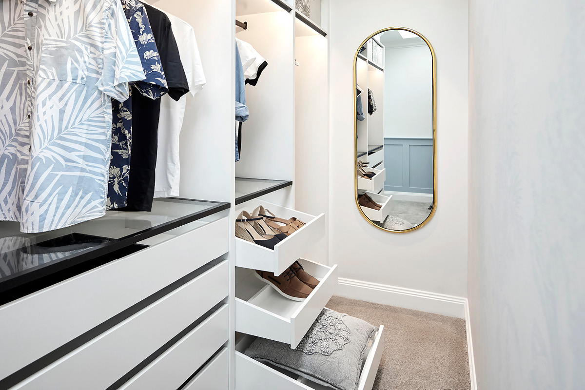 The Block's Kristy and Jesse guest bedroom design with white and black walk in wardrobe.