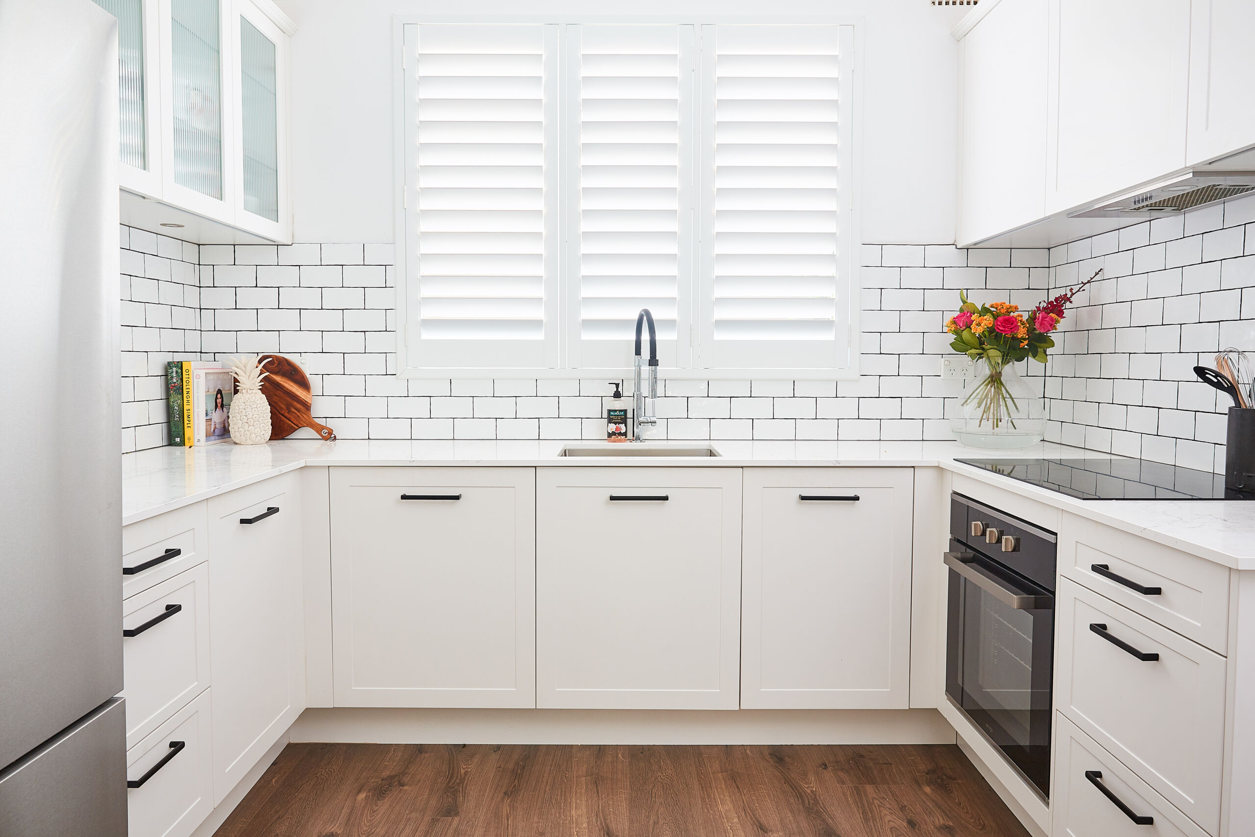 Small Kitchen Design with white cabinetry